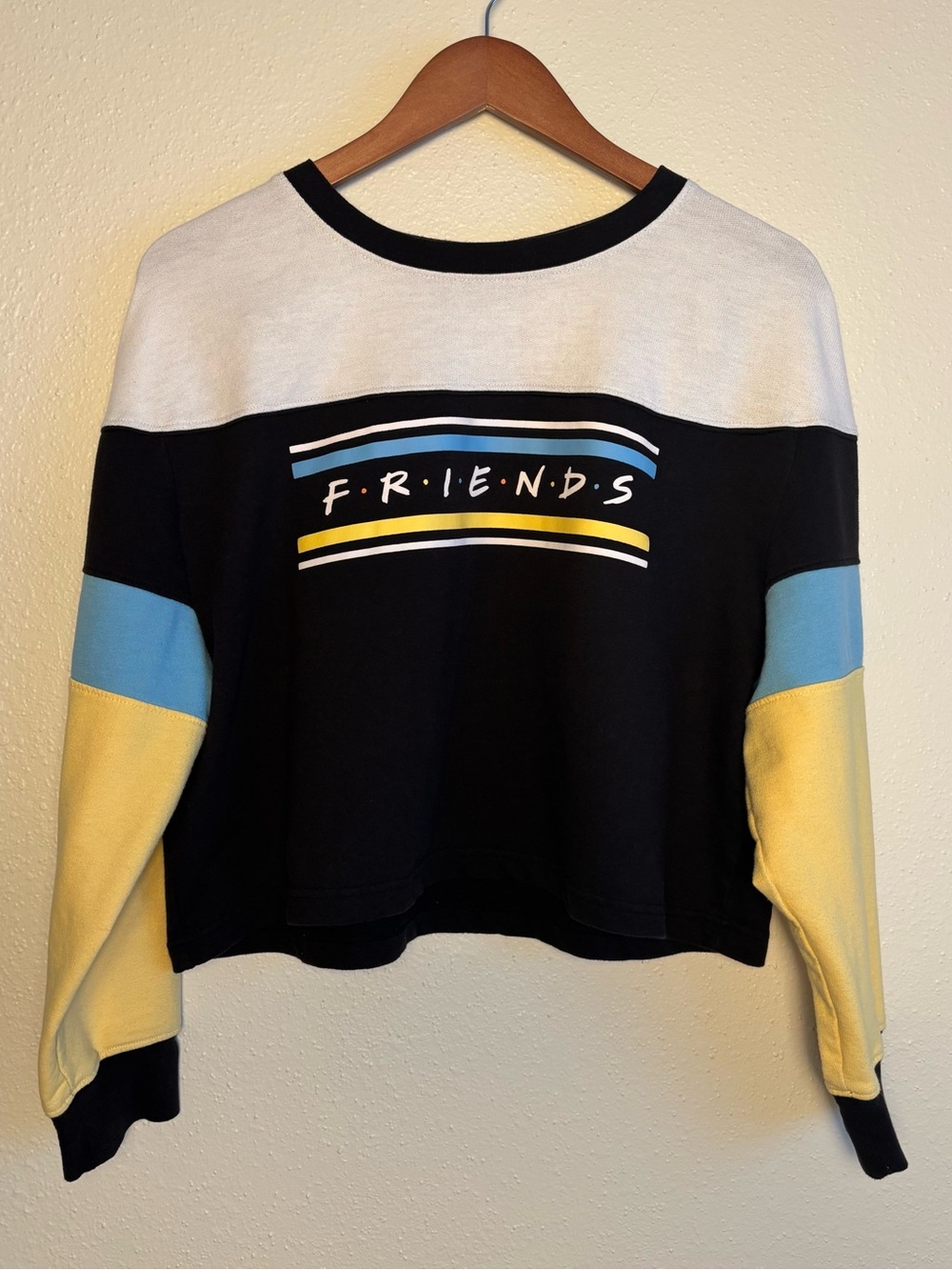 FRIENDS Colorblock Cropped Sweatshirt in Black, White, Blue & Yellow